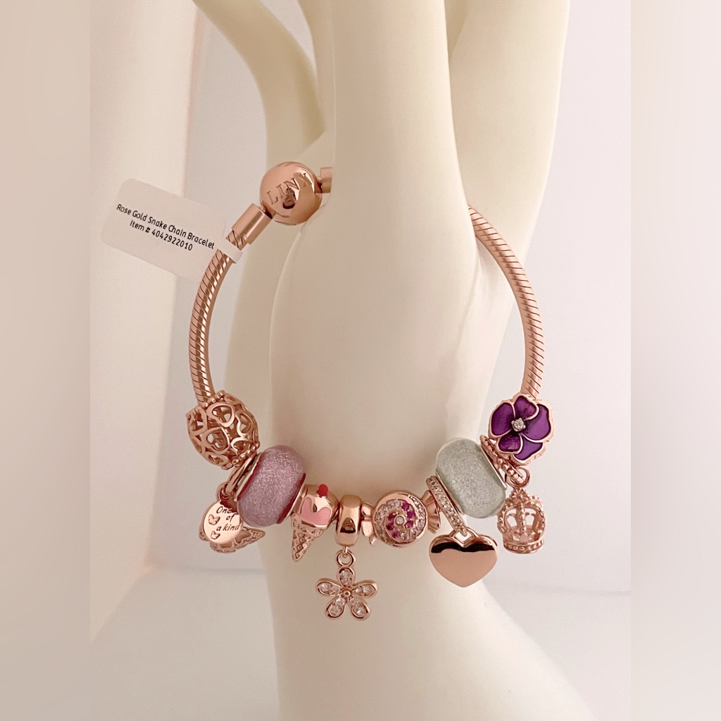 Linx Rose Gold Bracelet With Purple And Pink Themed Charms 199$